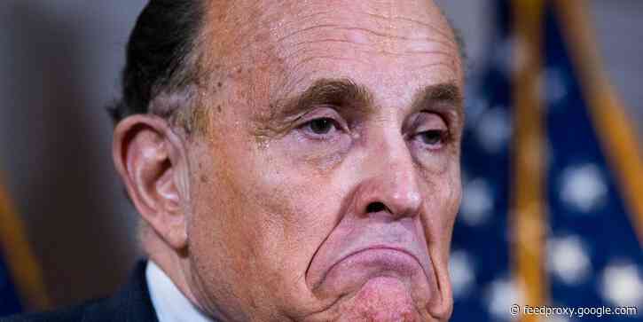 'Borat' producer says Rudy Giuliani tried to have the crew arrested after appearing to put a hand down his pants in front of a young female actor