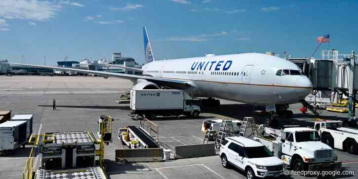 United Airlines flight forced to make an emergency landing after a 'report of someone's ear being bit off'