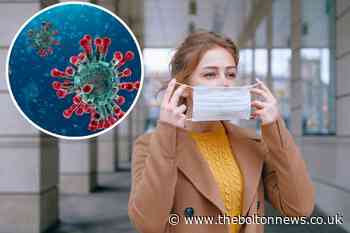 Face coverings and social distancing could remain, warns expert