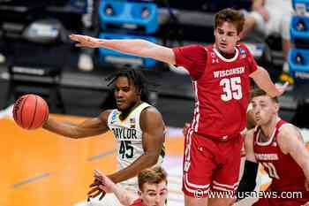 The Latest: Boeheim Vs Huggins, a Pair of 900-Game Winners