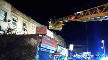 Firefighters rescue woman and two children from Tottenham blaze