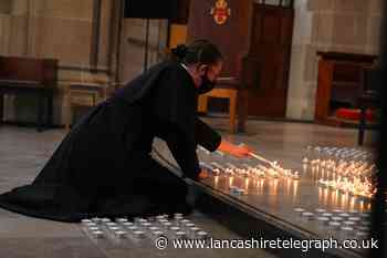IN PICTURES: Minute's silence and 4,161 candles lit at Cathedral to mark lockdown anniversary