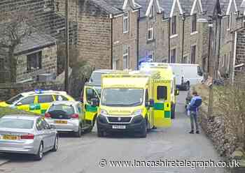 Large emergency service presence as body of man found inside house