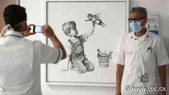 Banksy painting sells for nearly $30M Cdn at auction