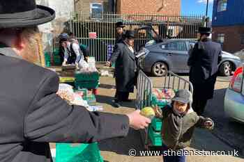Jewish volunteers distribute food packages to families ahead of Passover - St Helens Star