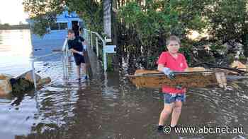 Friends, neighbours, strangers come together as flood clean-up begins