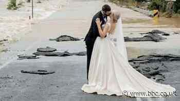 Australia floods: Stranded bride airlifted to wedding