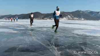 Pandemic couldn't keep ice-marathon diehards away from freezing temperatures, views on world's deepest lake