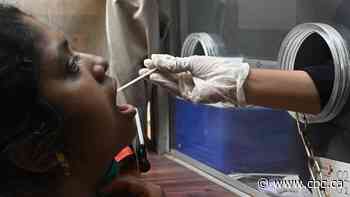 India reports 'double mutant' coronavirus variant as daily deaths reach year's high