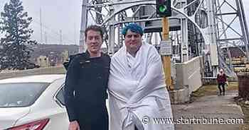 Lake Superior surfer saves man, dog from drowning in Duluth