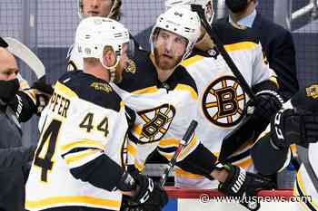 The Latest: NHL's Bruins Resume Practice, Scheduled to Play