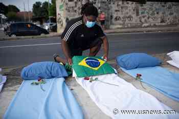 The Latest: Brazil 2nd Nation to Top 300,000 COVID-19 Deaths