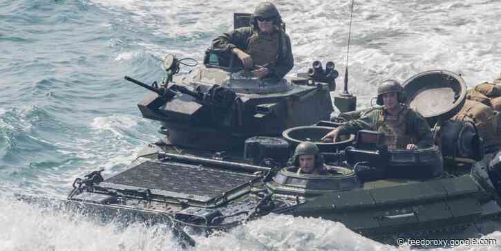 US troops had to use their phones as flashlights to try to escape a sinking assault amphibious vehicle that killed 9 of them