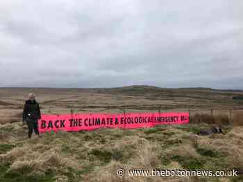 Climate andEcological Emergency Bill:Bolton group joins nationwide banner drop
