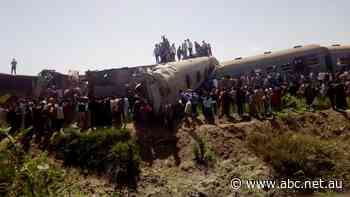 Egyptian trains collide, killing dozens, after 'unknown individuals' activate emergency brakes