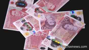 Artificial intelligence savant and WWII hero Alan Turing honored on UK's new 50-pound note