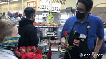 11-year-old boy gives flowers to King Soopers employees after mass shooting