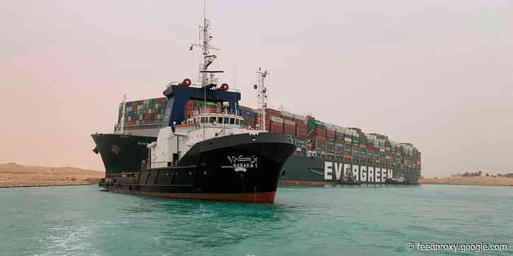 Video shows tug boats honking in celebration as they moved the Suez Canal ship a small distance but it remains lodged