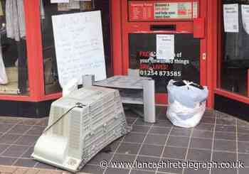 TV and stand dumped outside of Darwen charity shop are the 'worst' items to be left yet