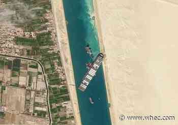 Canal service provider says container ship in Suez set free