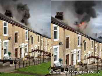 Video shows smoke and flames burst through roof of terraced house in Darwen