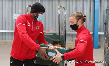 City players distribute food parcels - Radio Exe