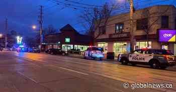 Toronto police charge 2 men after bank robbery in Mimico that seriously injured officer - Globalnews.ca