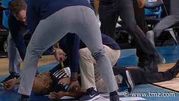 NCAA Referee Bert Smith Collapses On Court During Elite 8 Game, But Seems Okay