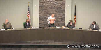 Asian American official shows his military scars during meeting, asks 'Is this patriot enough?'