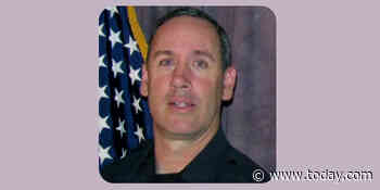 Colorado shooting suspect put in handcuffs belonging to slain officer Eric Talley