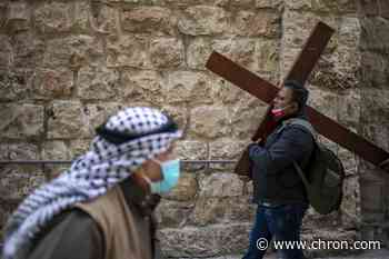 Christians mark Good Friday amid lingering virus woes