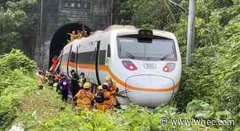 Train hits truck that slid onto track in Taiwan, killing 51