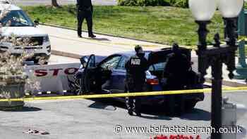 Two officers injured after car rams US Capitol barricade
