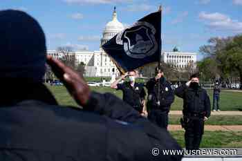 The Latest: Flags at Half-Staff After Capitol Officer Killed
