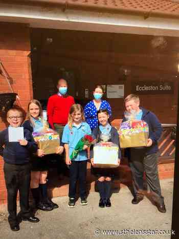 Eccleston Mere pupils deliver Easter eggs to Eccleston Court - St Helens Star