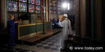 Holy Thursday service held at fire-ravaged Notre Dame