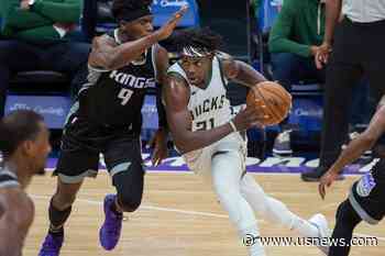 Holiday, Bucks Ink 4-Year Extension Worth at Least $134M