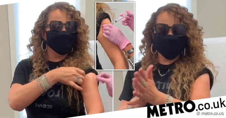 Mariah Carey hits whistle note in iconic video as she gets Covid jab
