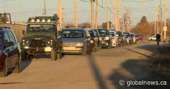 Long lineups as drive-thru COVID-19 vaccination site opens in Saskatoon