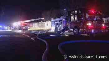 Brooklyn Park residents jump in to help battle house fire