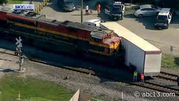 Train crashes into semi-truck near Houston Heights, causing traffic delays - KTRK-TV