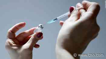 The temporary halt comes as UK regulators review the occurrence of rare blood clots in adults