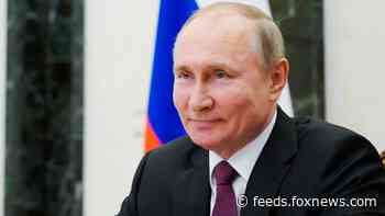 Putin signs law allowing him 2 more terms as Russia's leader