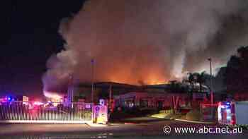 Visy recycling factory burns in Adelaide's north