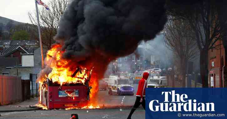 Protesters in Belfast hijack bus and set it on fire – video