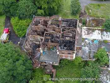 Historic hall gutted by fire is on 'at risk' register