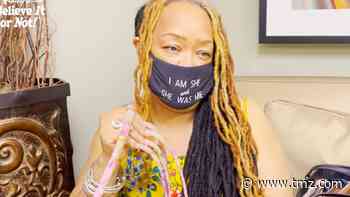 Woman with World's Longest Fingernails Gets Them Sawed Off