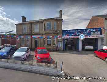 BOLTON: Plans for demolition of former car garage to make way for shops and flats