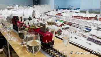 Watch model train play classical music medley with glasses