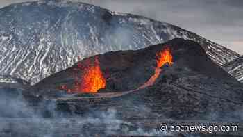 Hikers scramble as new fissure opens up at Icelandic volcano
